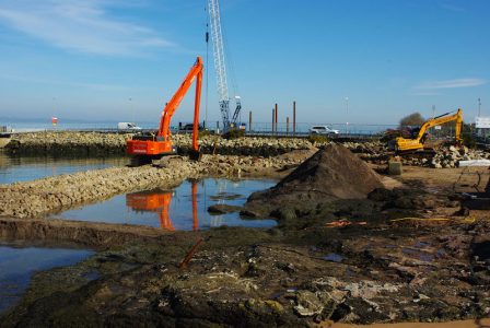 The lagoon inside the existing pier and linkspan is being reclaimed -- copyright Eric Schofield